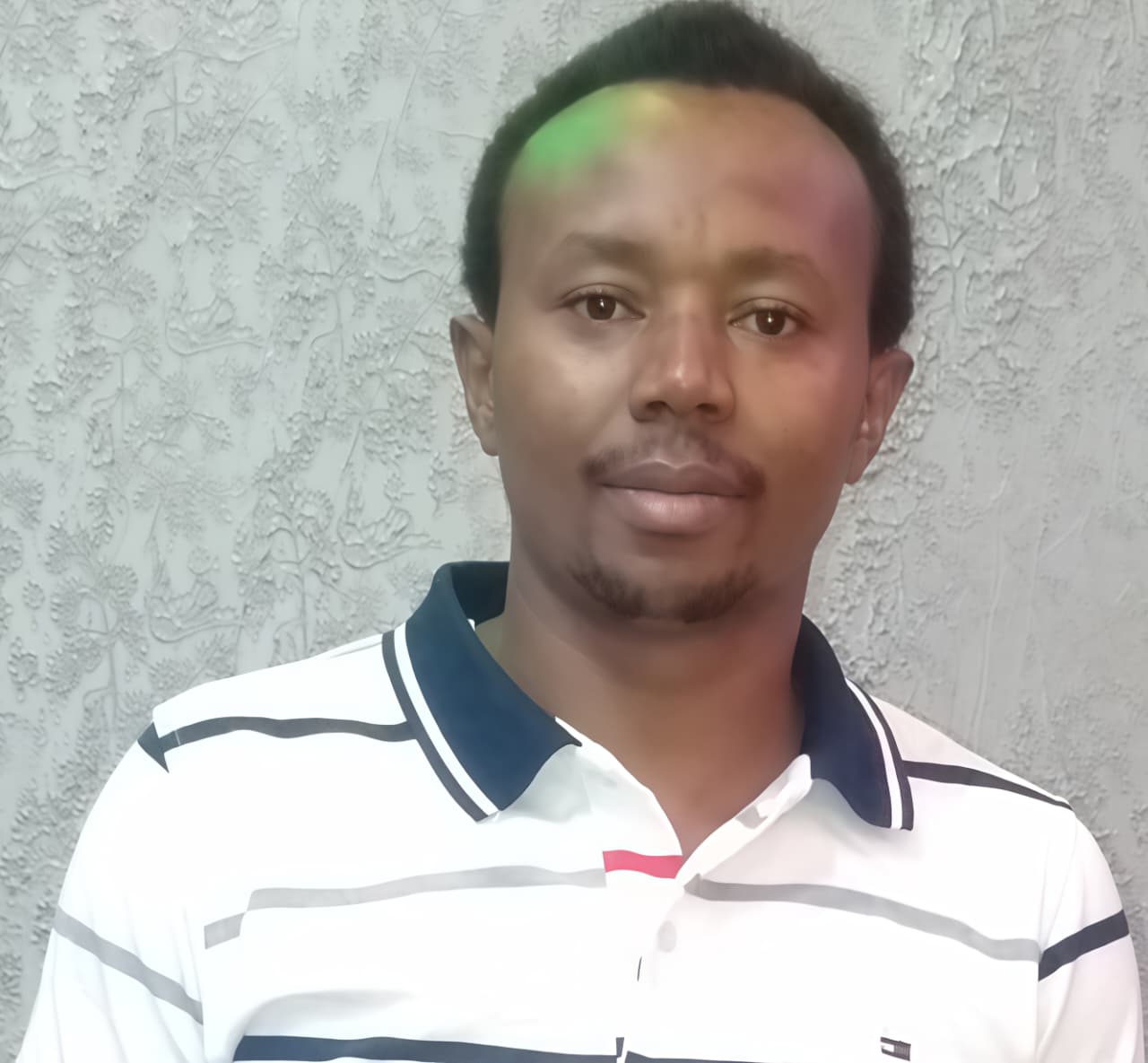 Samuel Kaburia Kimenyi - CEO